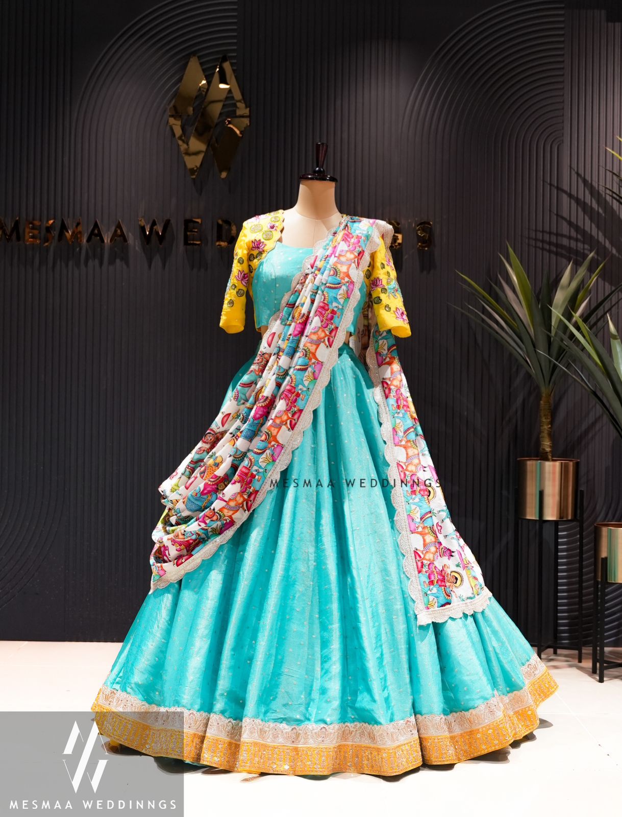 Blue white yellow lehenga.