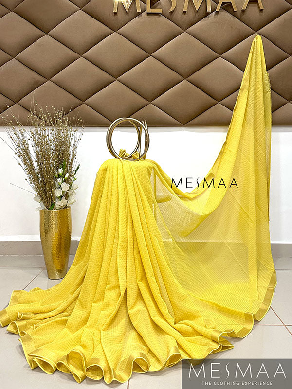 Yellow georgette saree