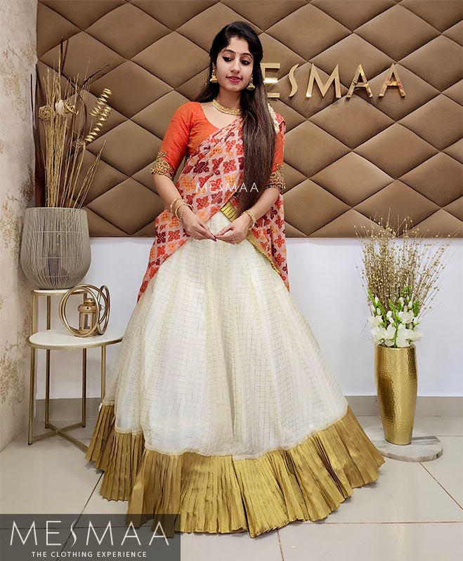 Half white orange half saree