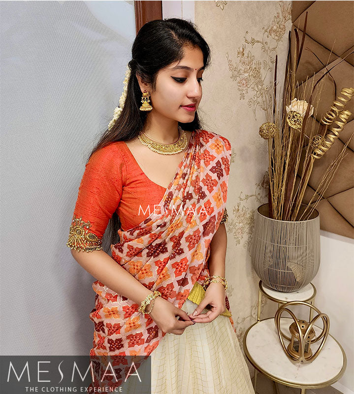 Half white orange half saree