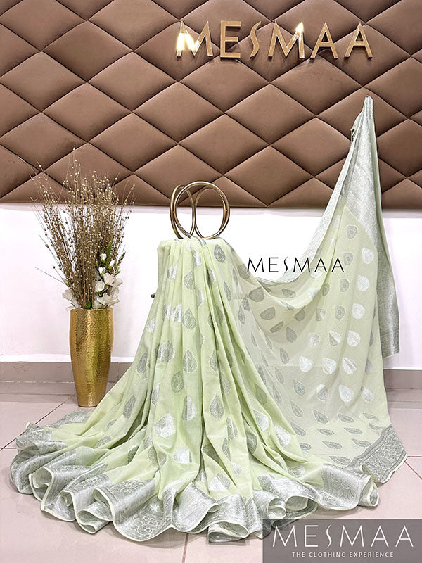 Patel green semi georgette saree