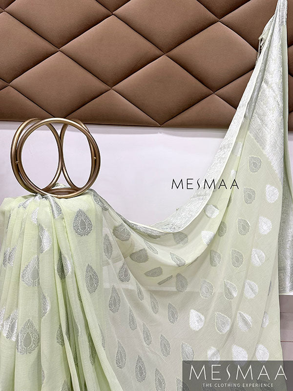 Patel green semi georgette saree