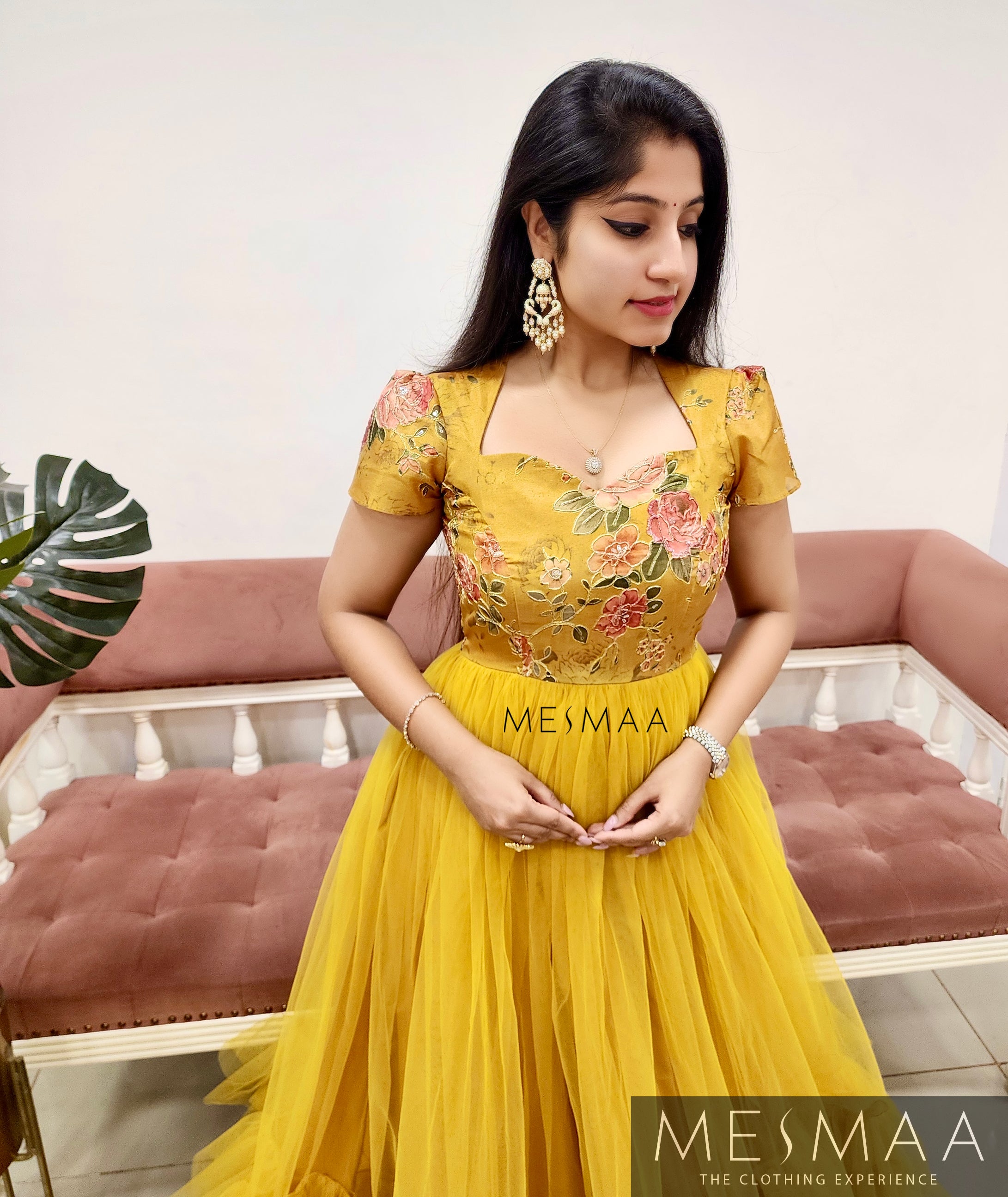 Haldi yellow flared gown.