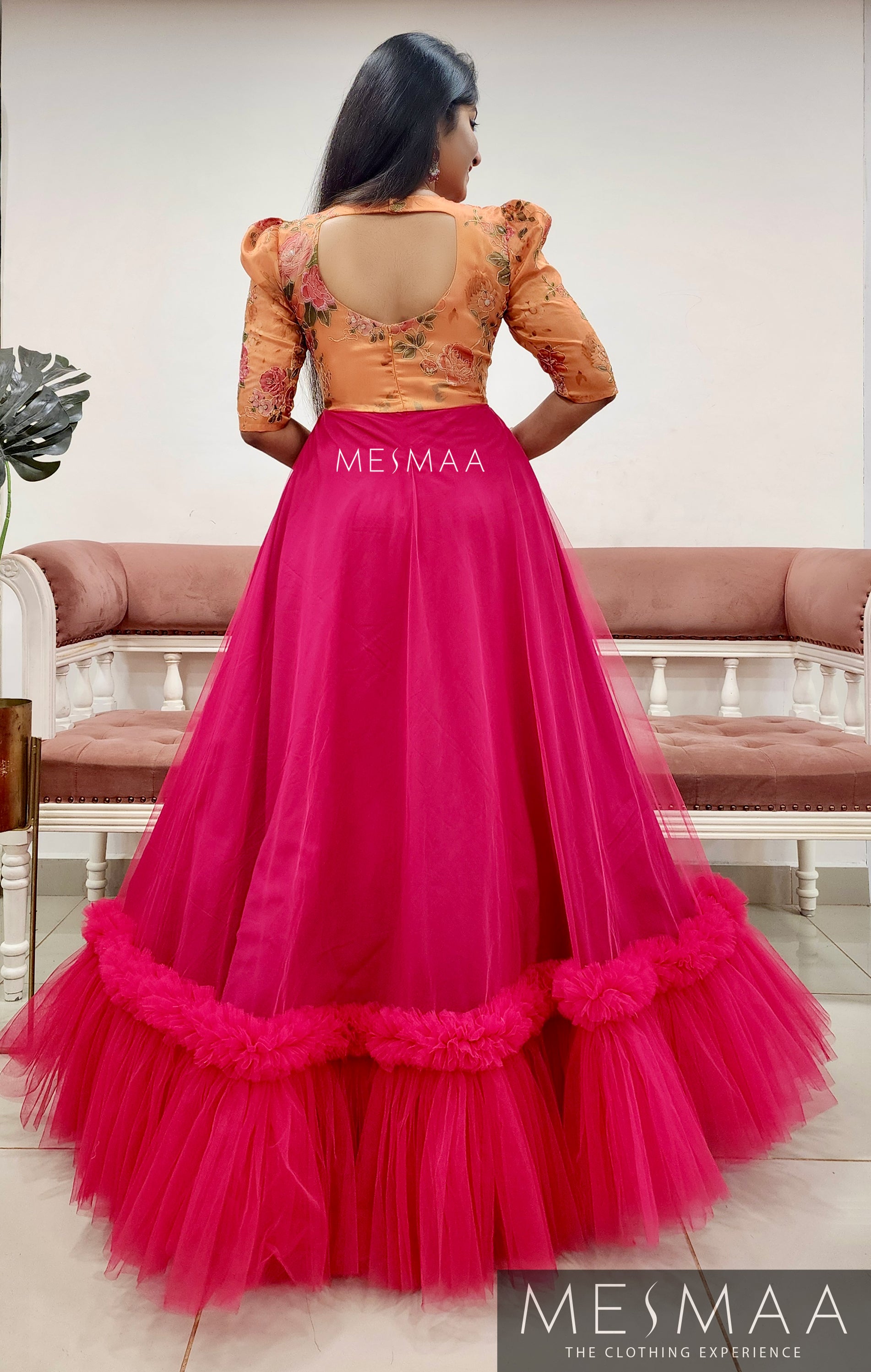 Tangerine ruby pink flared gown.