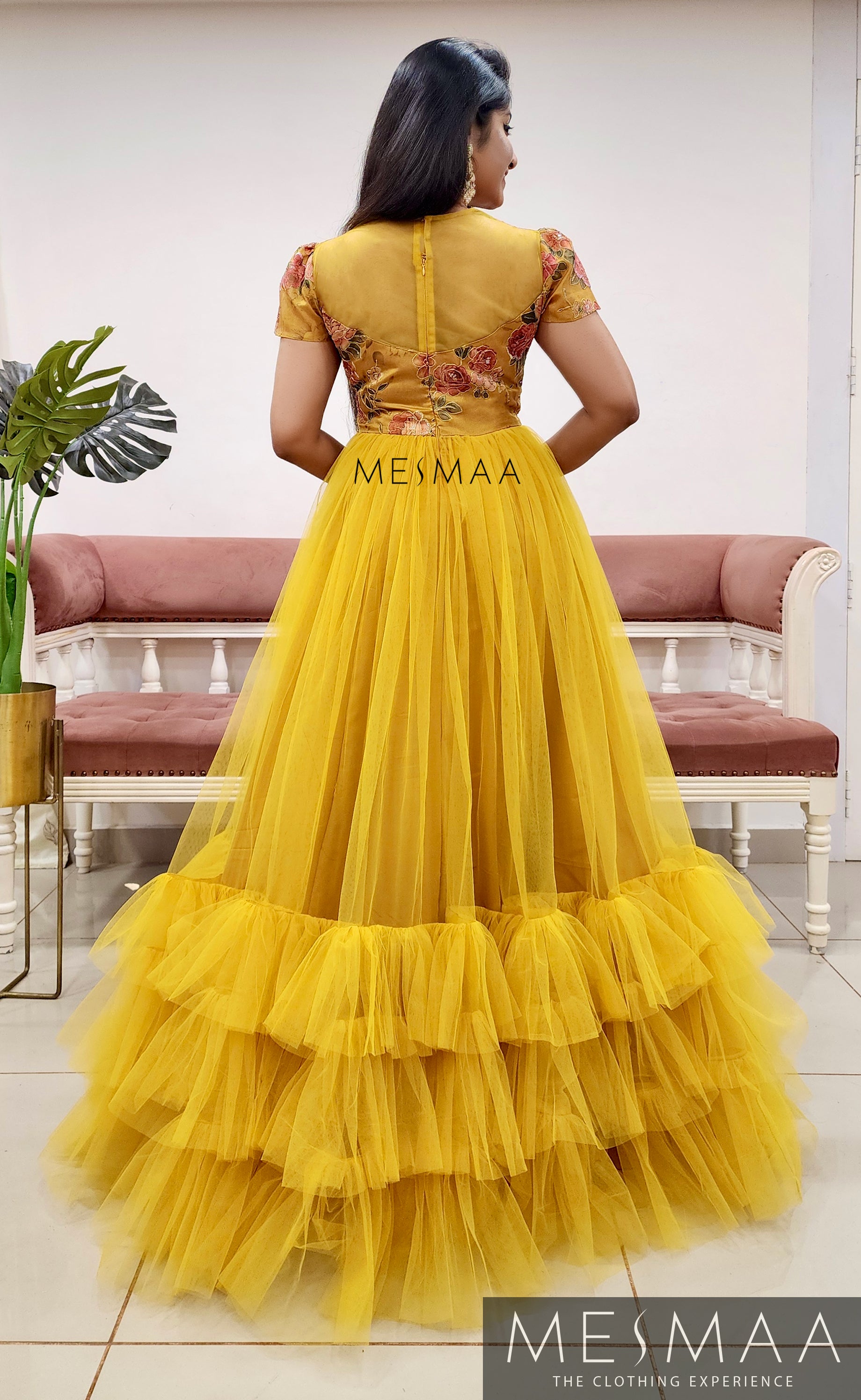 Haldi yellow flared gown.