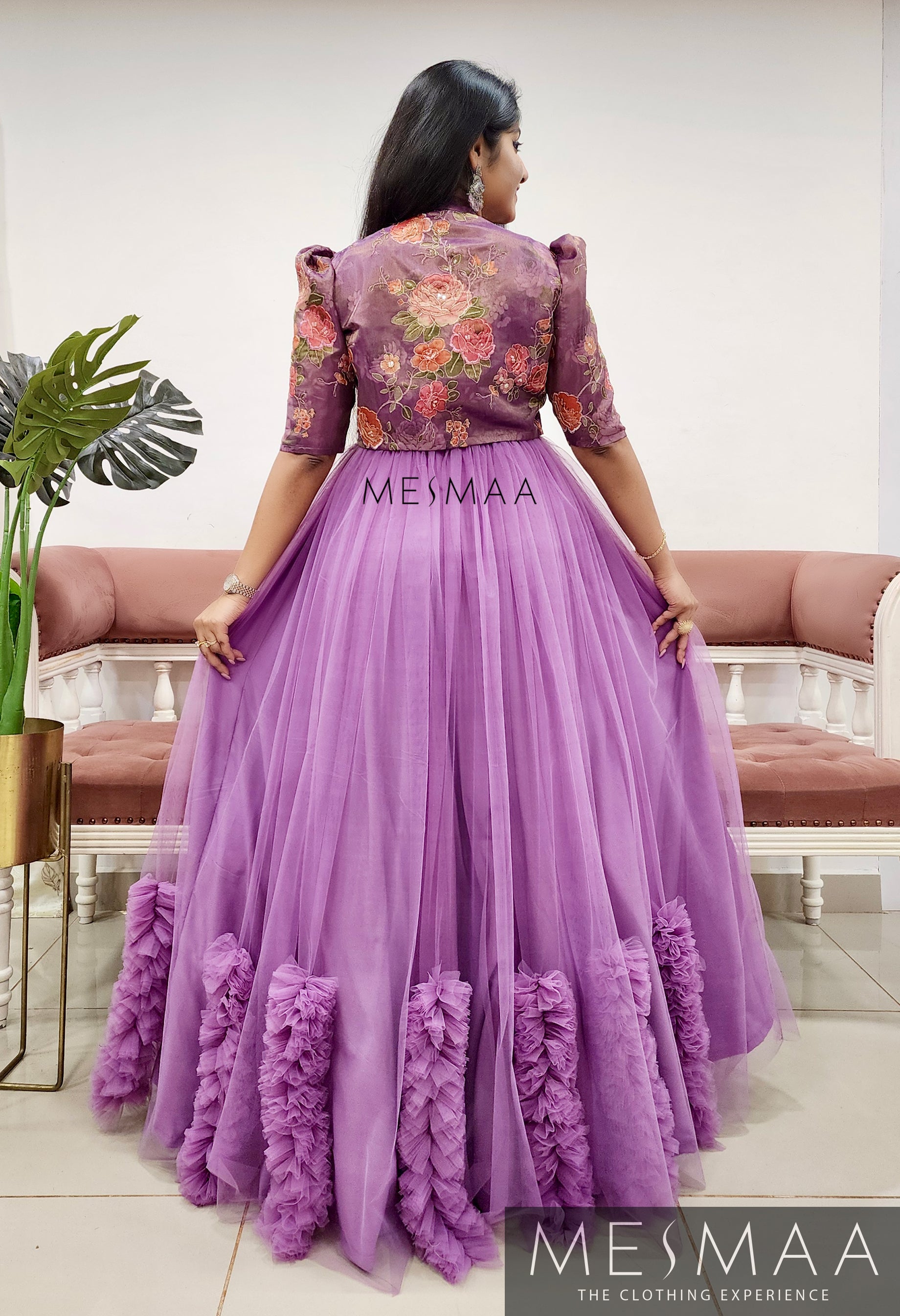 Lavender flared gown.