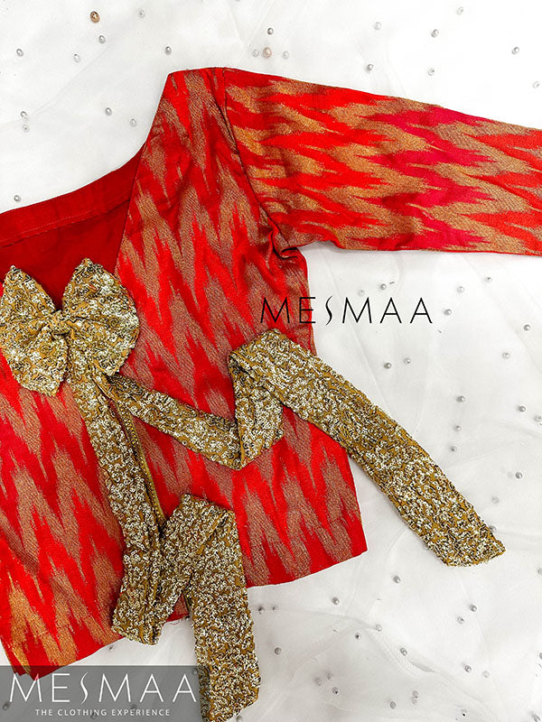 Pinkish orange banaras silk top.