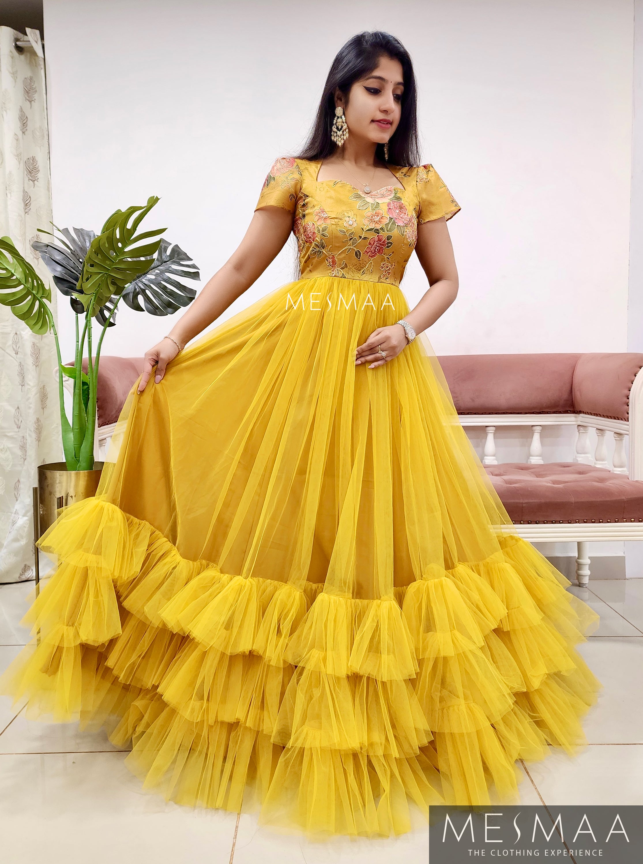 Haldi yellow flared gown.