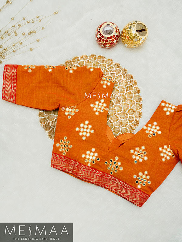 Dual shaded orange red blouse.