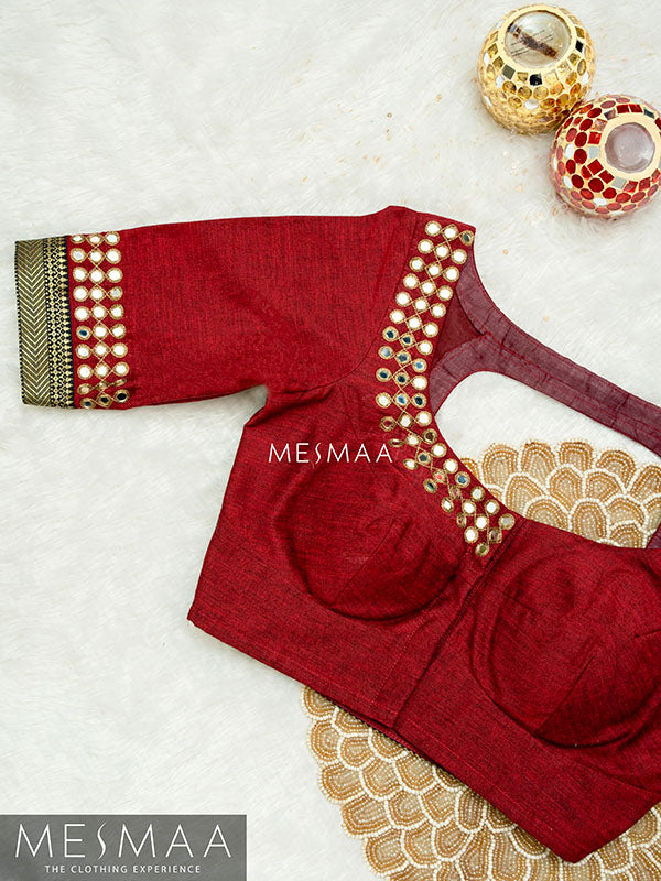 Maroon black kolam blouse.
