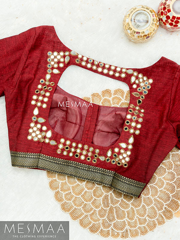 Maroon black kolam blouse.