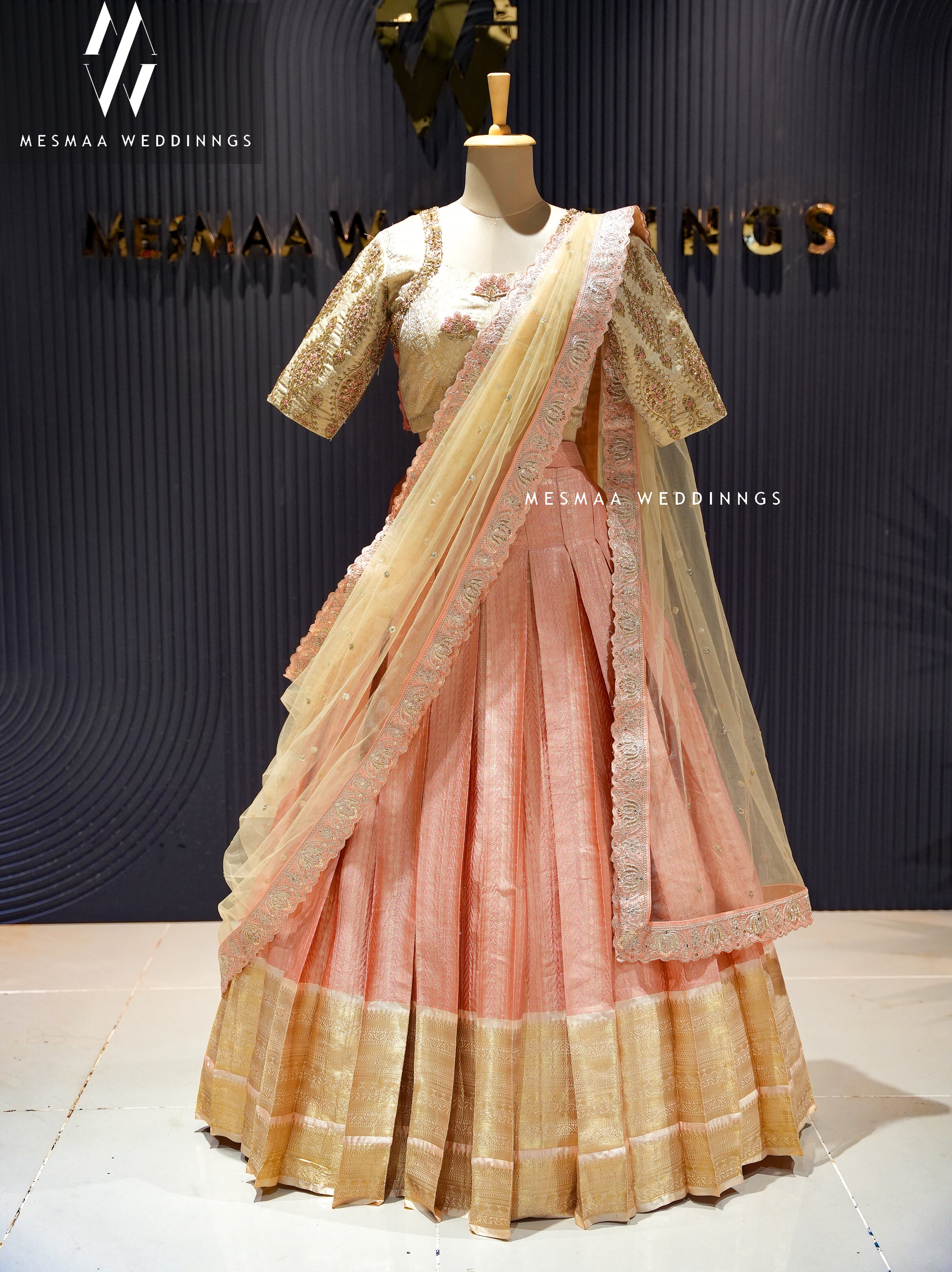 PEACH HALF WHITE PATTU HALF SAREE.