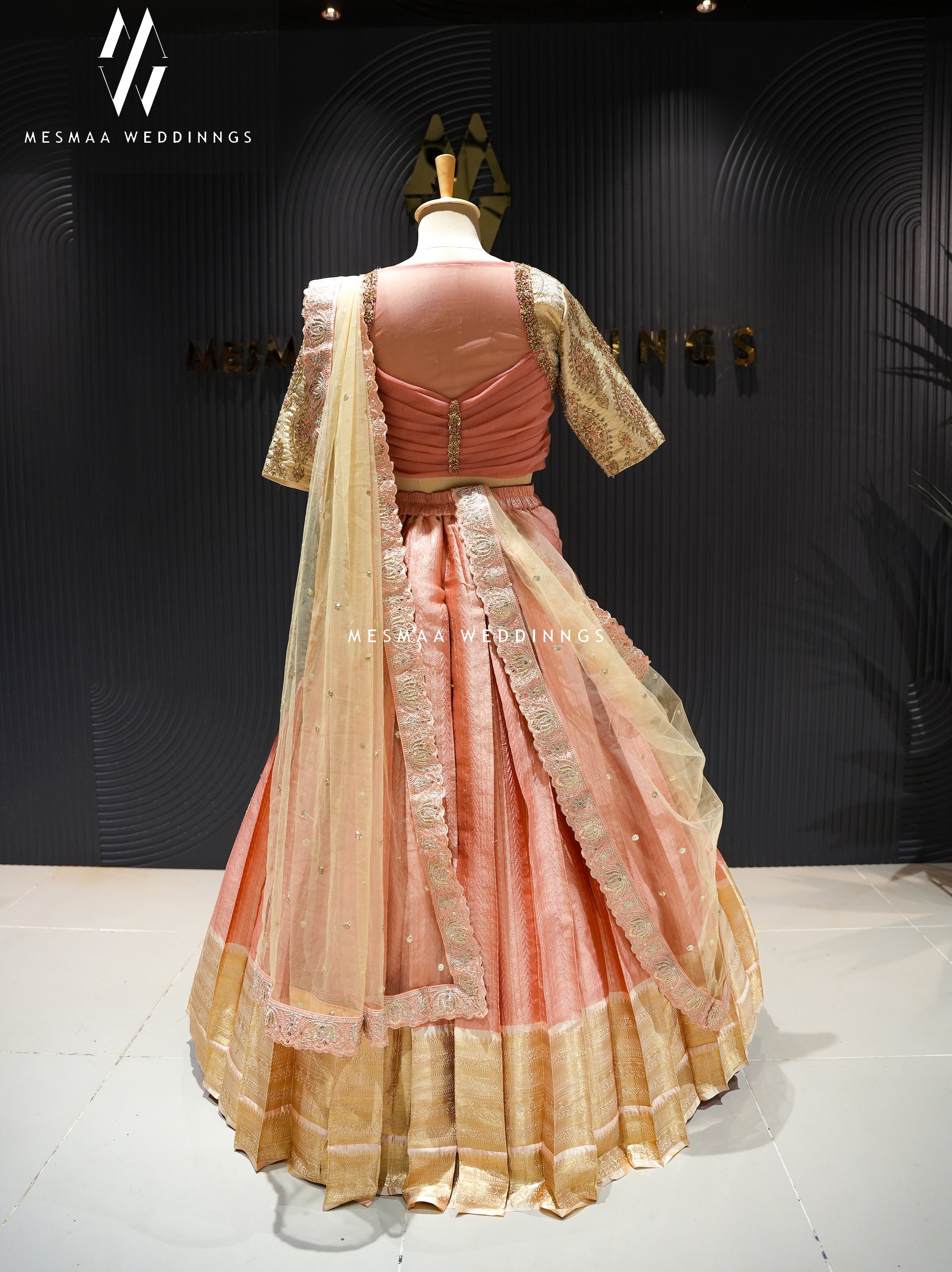 PEACH HALF WHITE PATTU HALF SAREE.