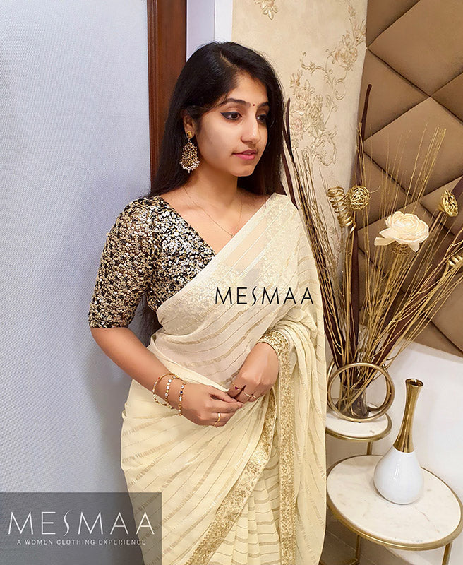 Pale yellow striped saree