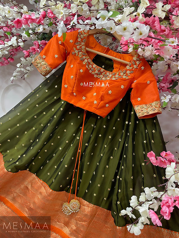 Orange olive green bridal lehenga