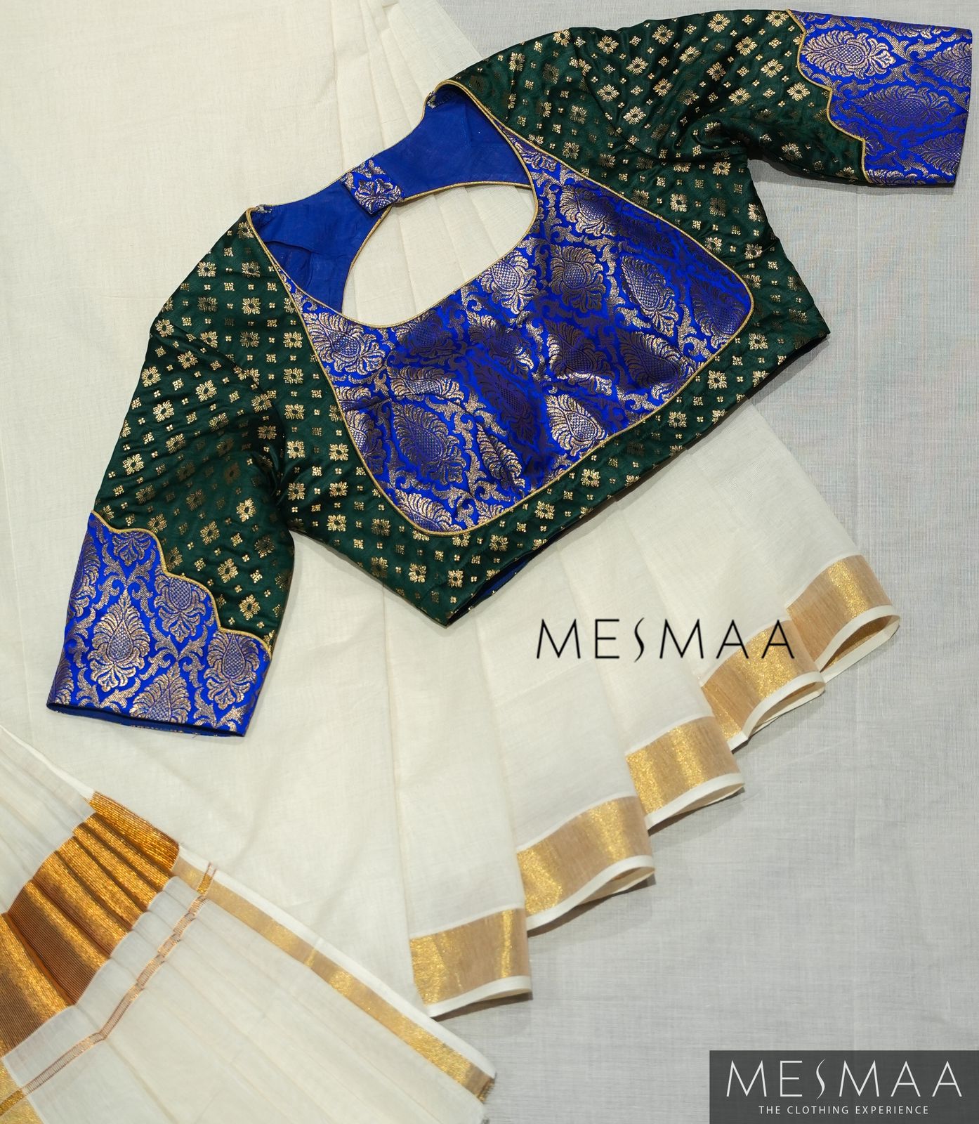 Bottle green electric blue silk blouse.