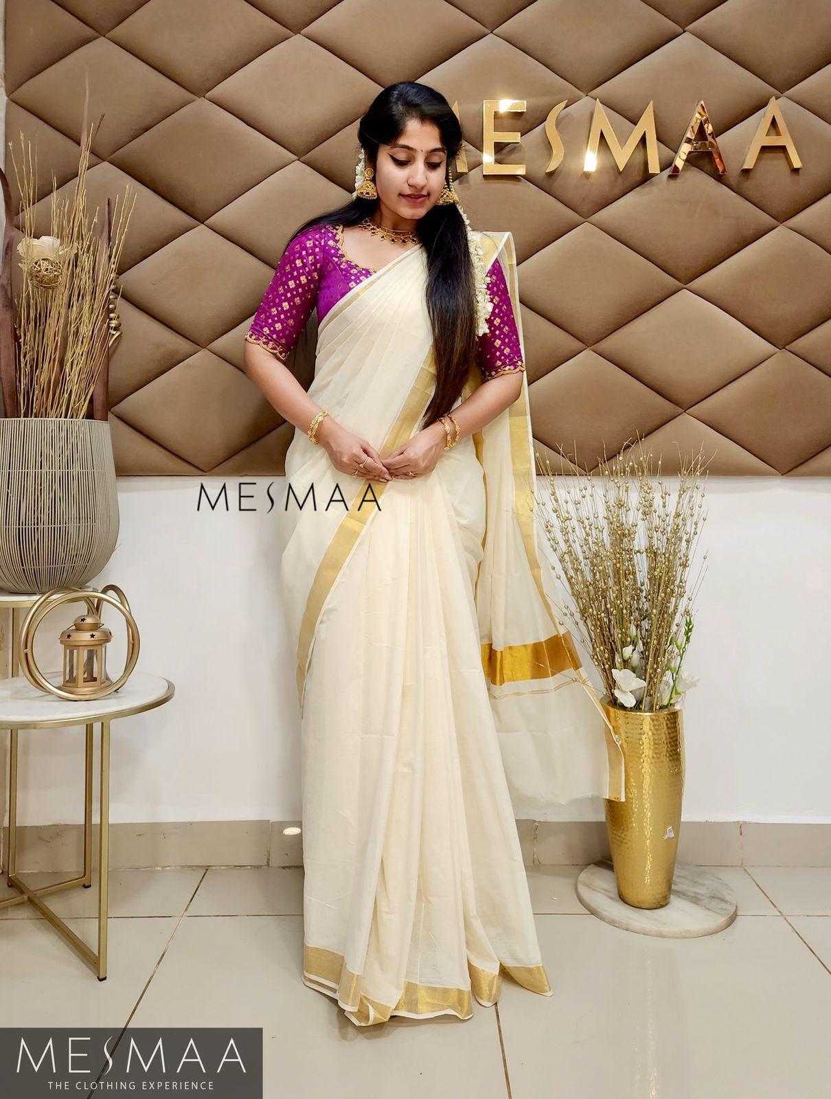 Classic cotton kasavu saree.