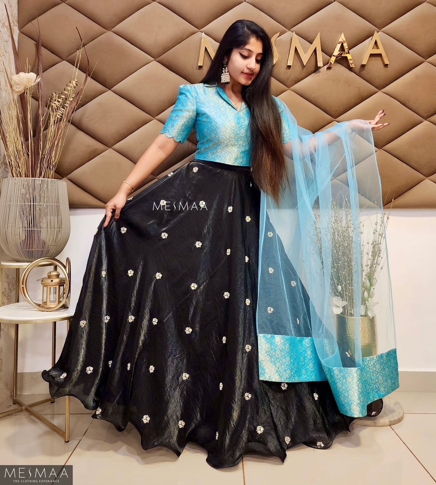 Sky blue black tissue organsa lehenga.