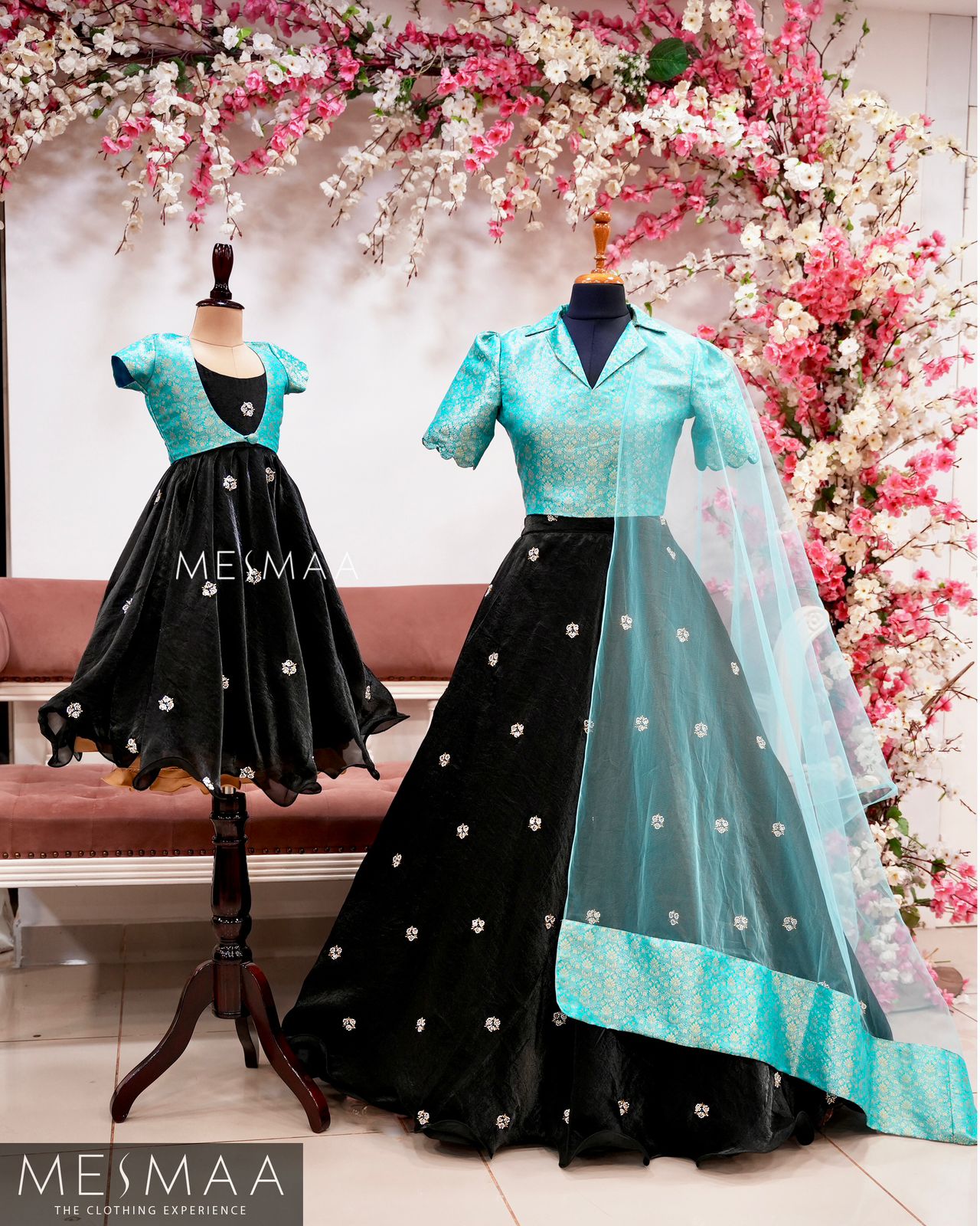 Sky blue black kids gown.