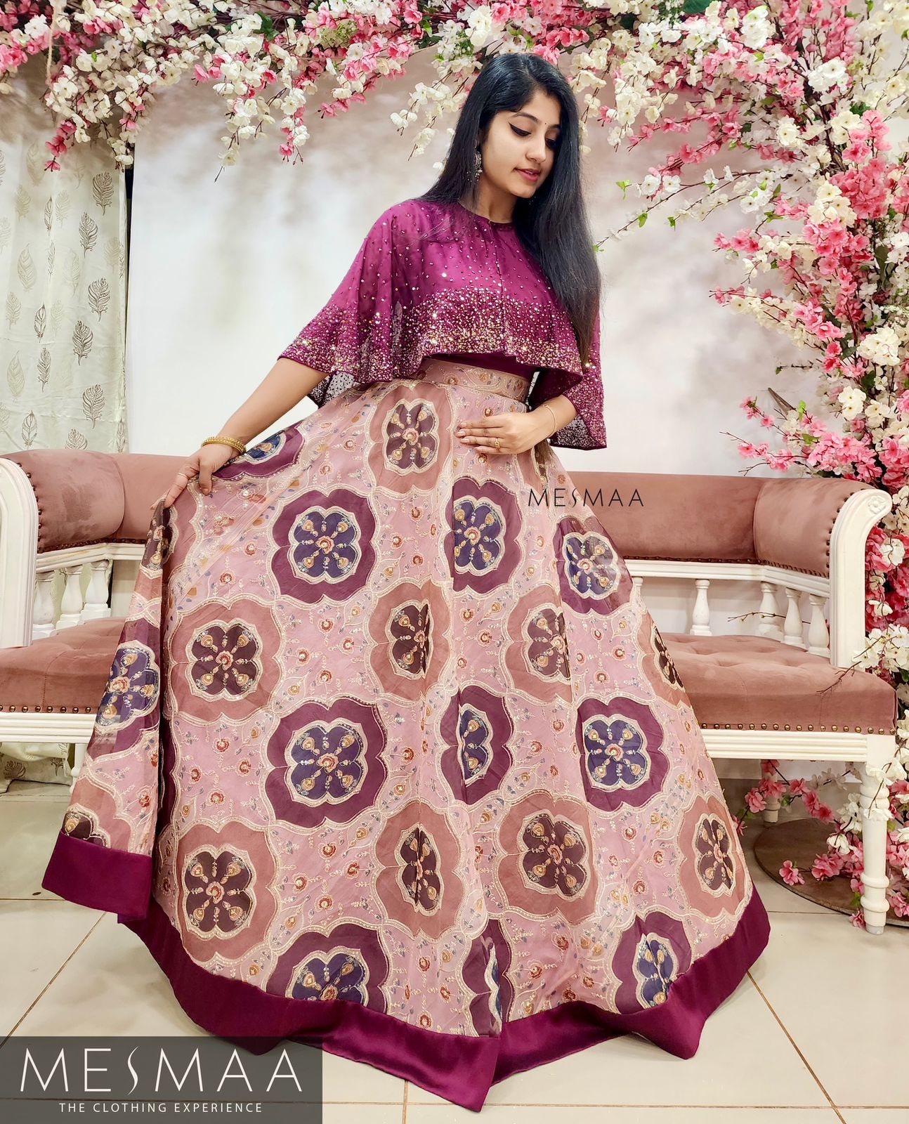 Vine dusty pink cape lehenga.