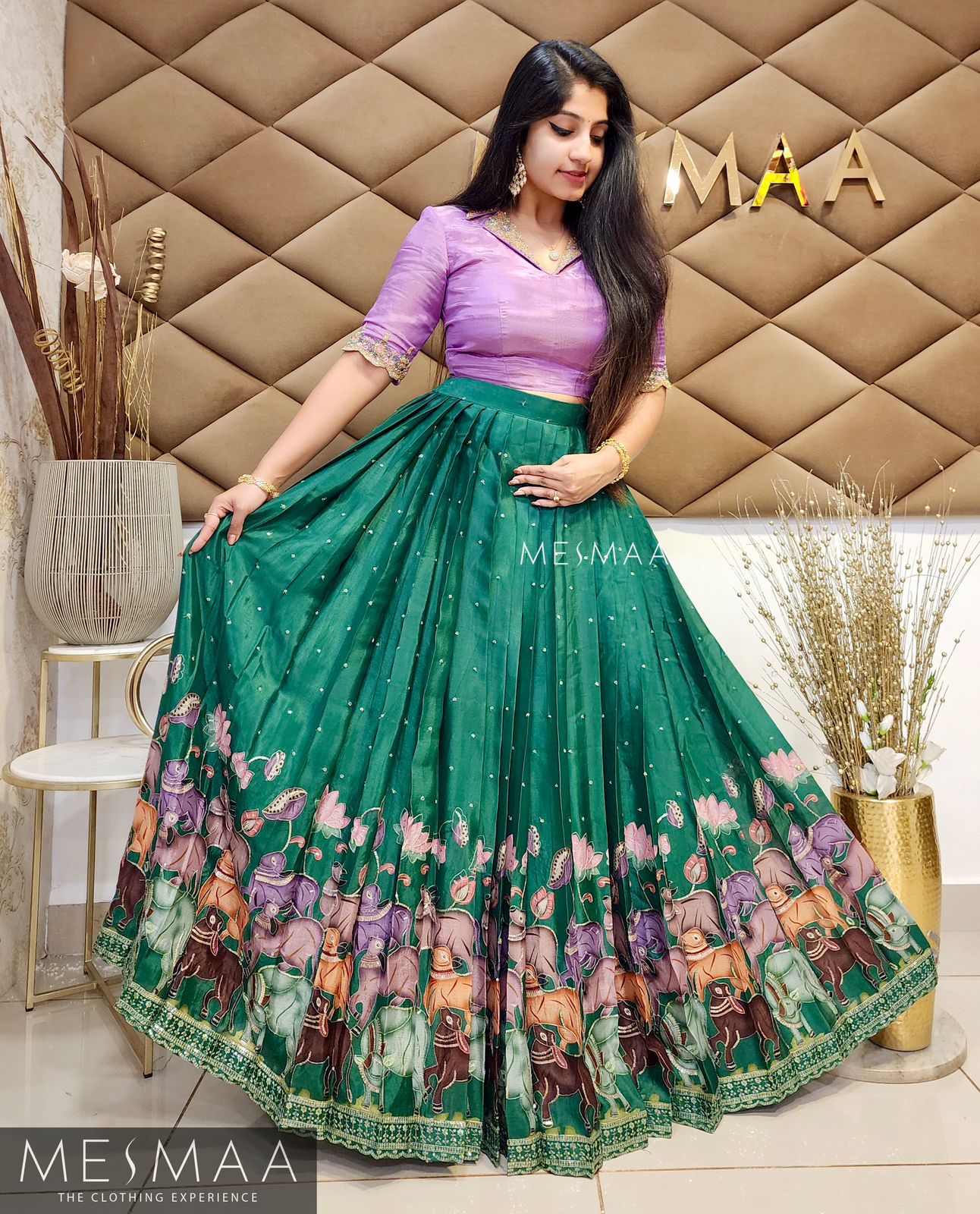 Lilac bottle green pichwai lehenga.