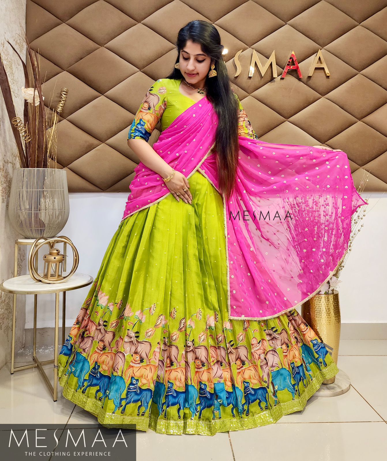 Bright green pink pichwai lehenga.