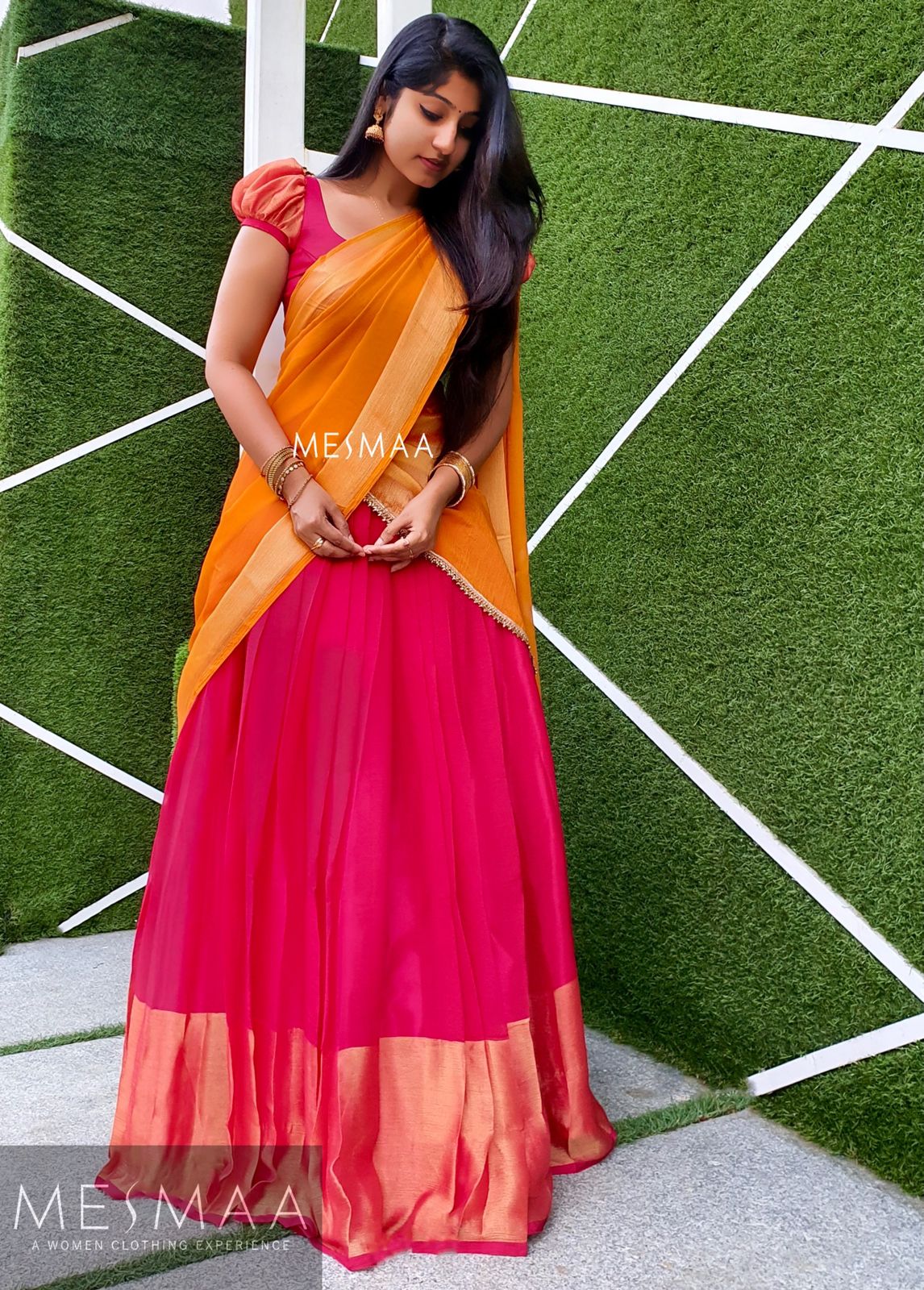 Reddish pink yellow half saree.