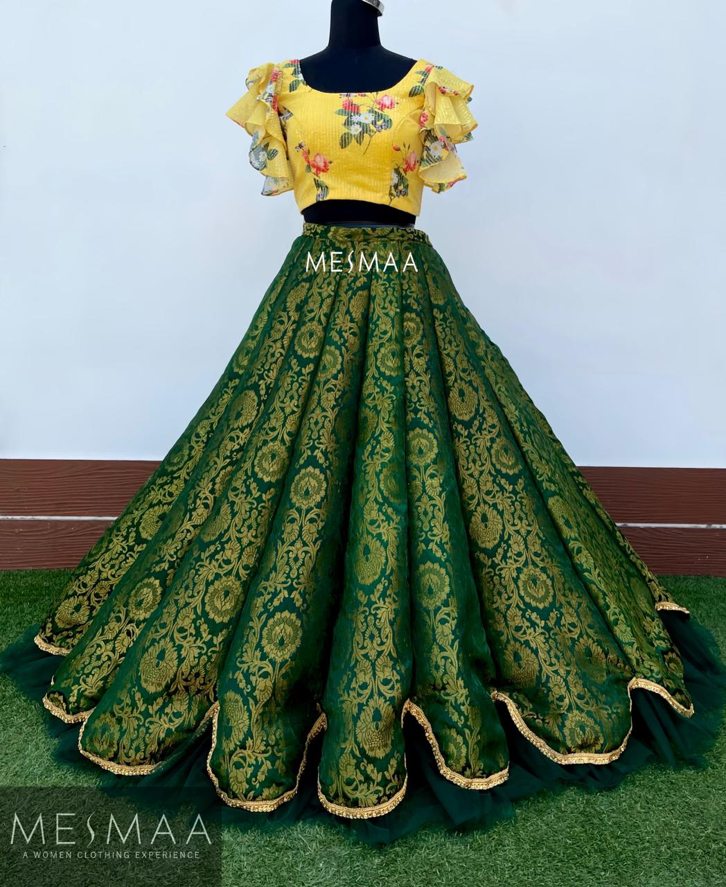 Bottle green lehenga.
