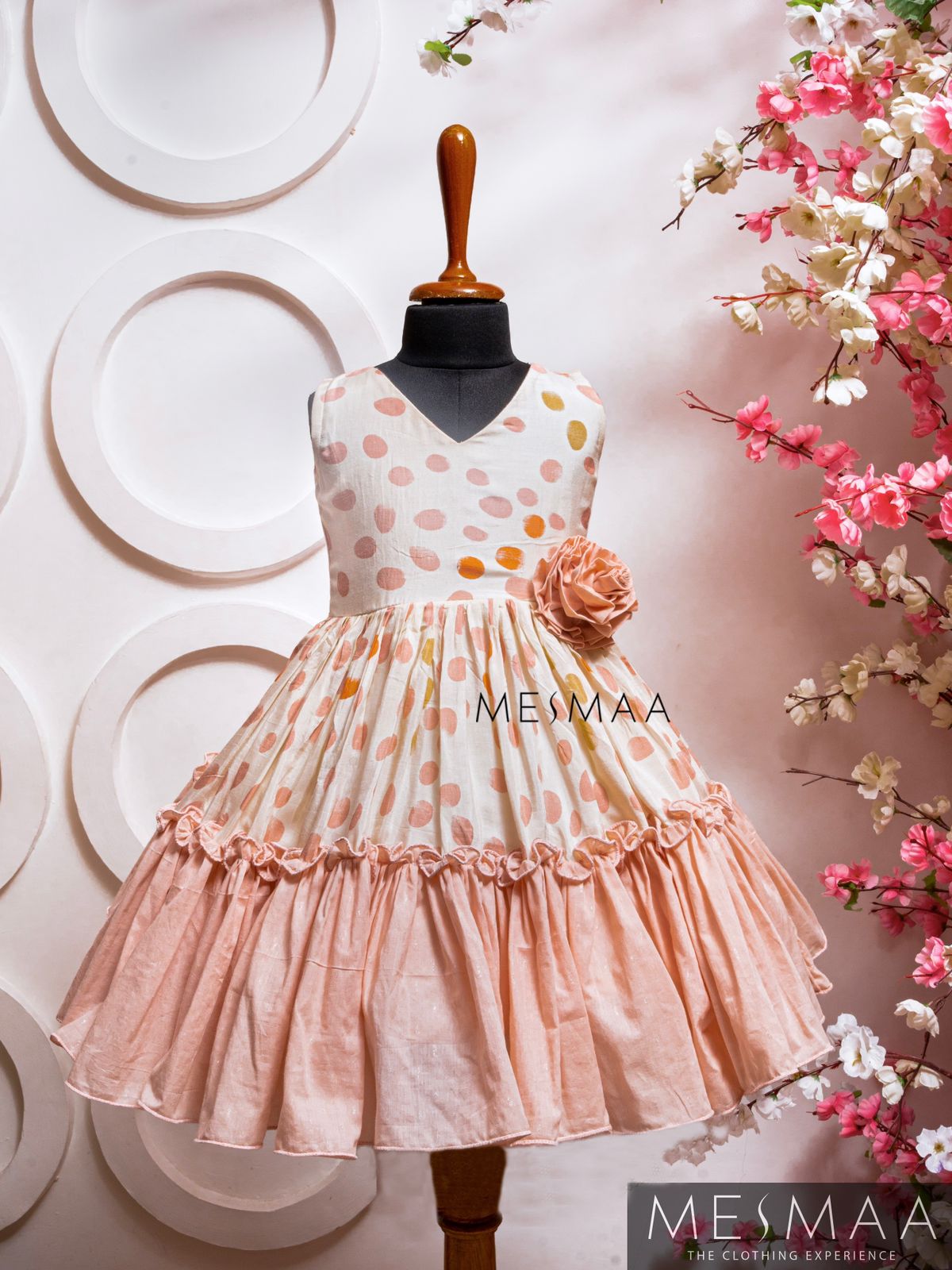 White blush pink dotted kids gown.