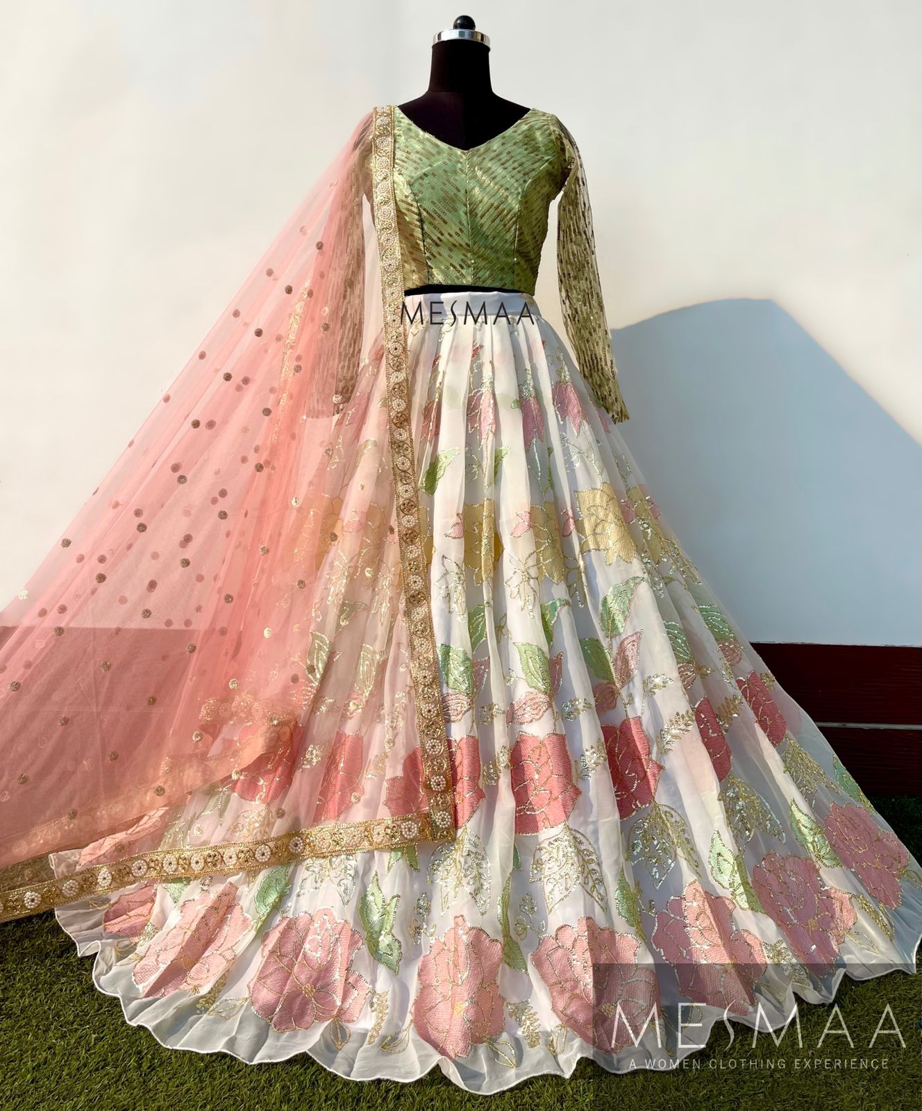 White pink green peach lehenga