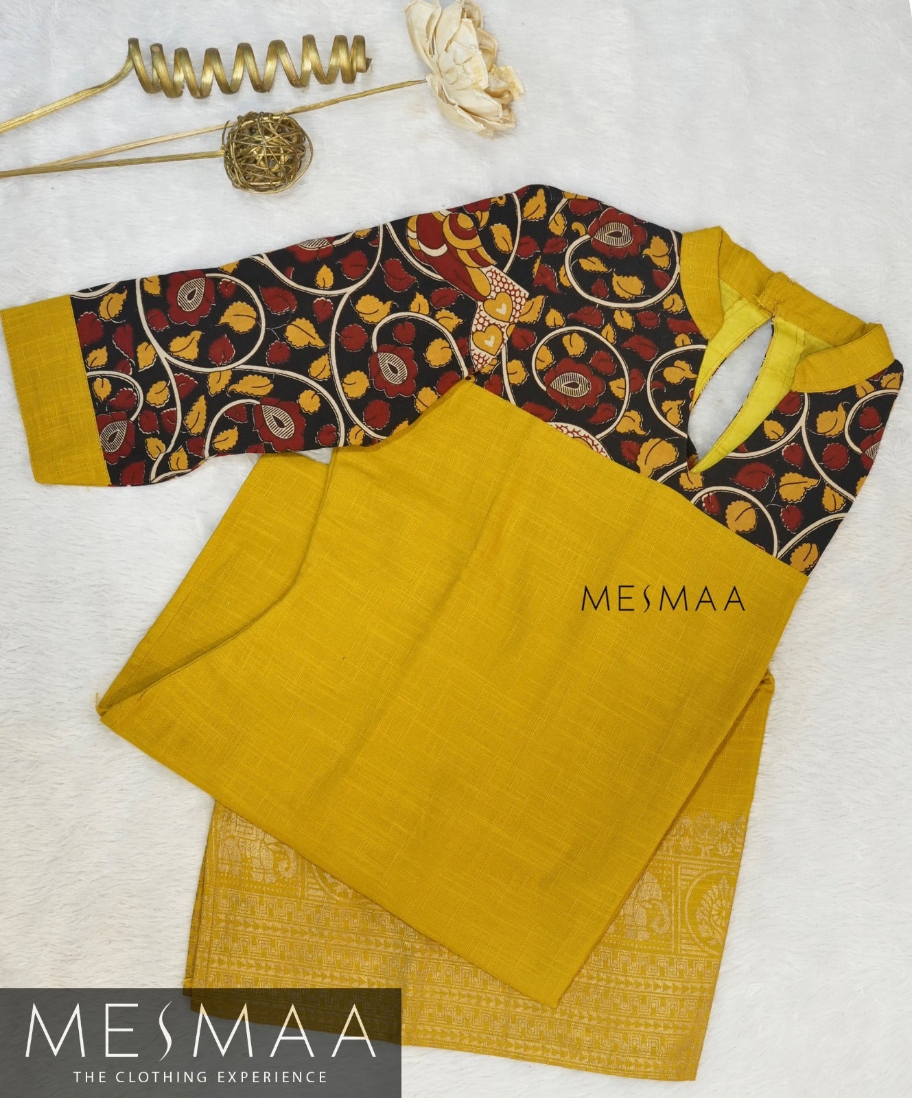 Mustard yellow black kalamkari kurthi.