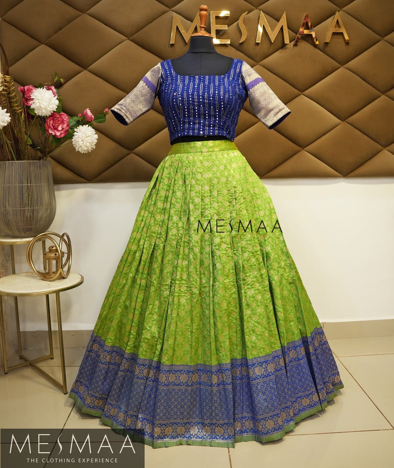 Royal blue parrot green silk lehenga.
