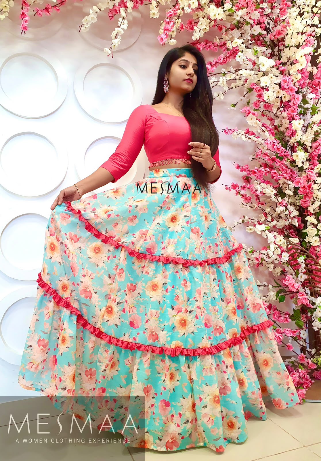 Coral sky blue floral lehenga.