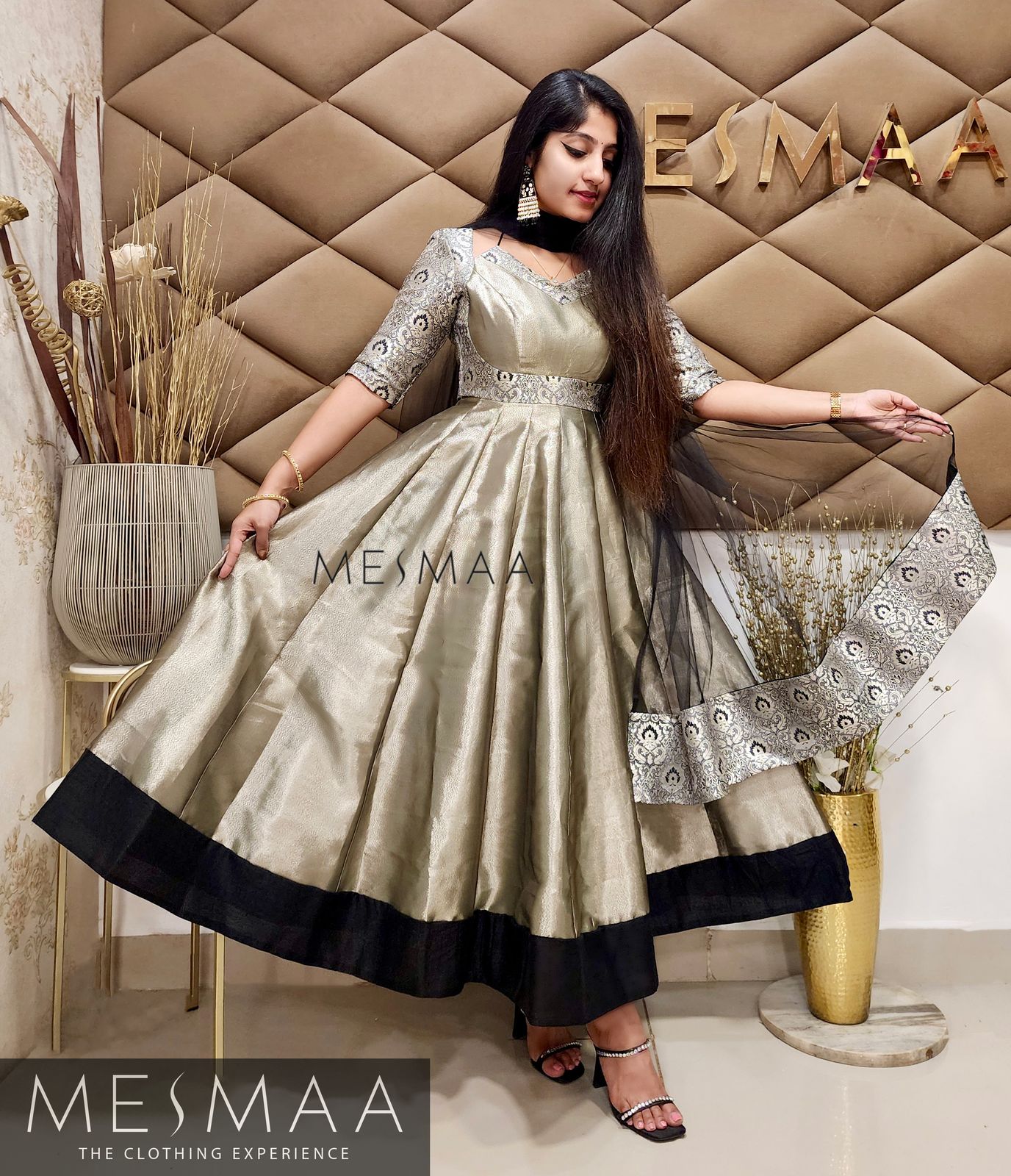 Golden black silver tissue anarkali.