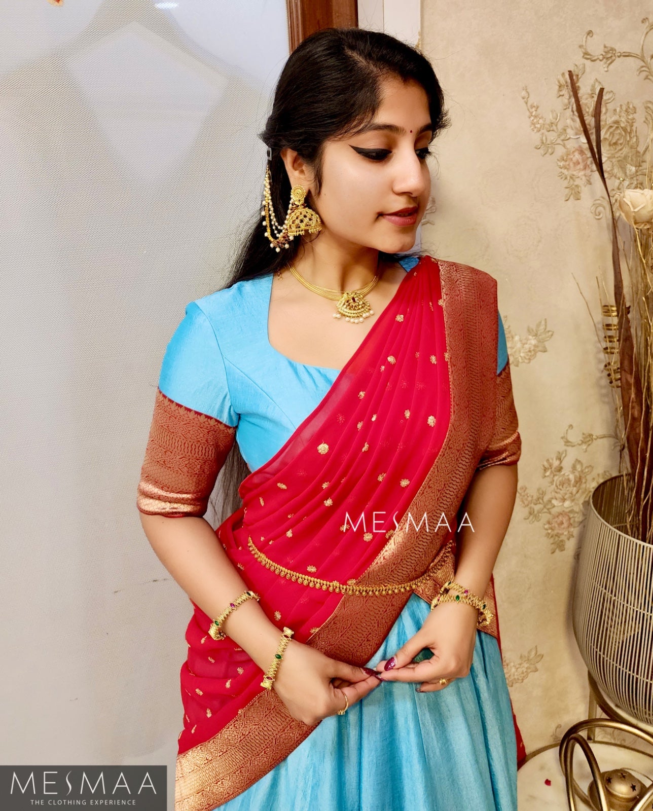 Crimson red sky blue half saree.