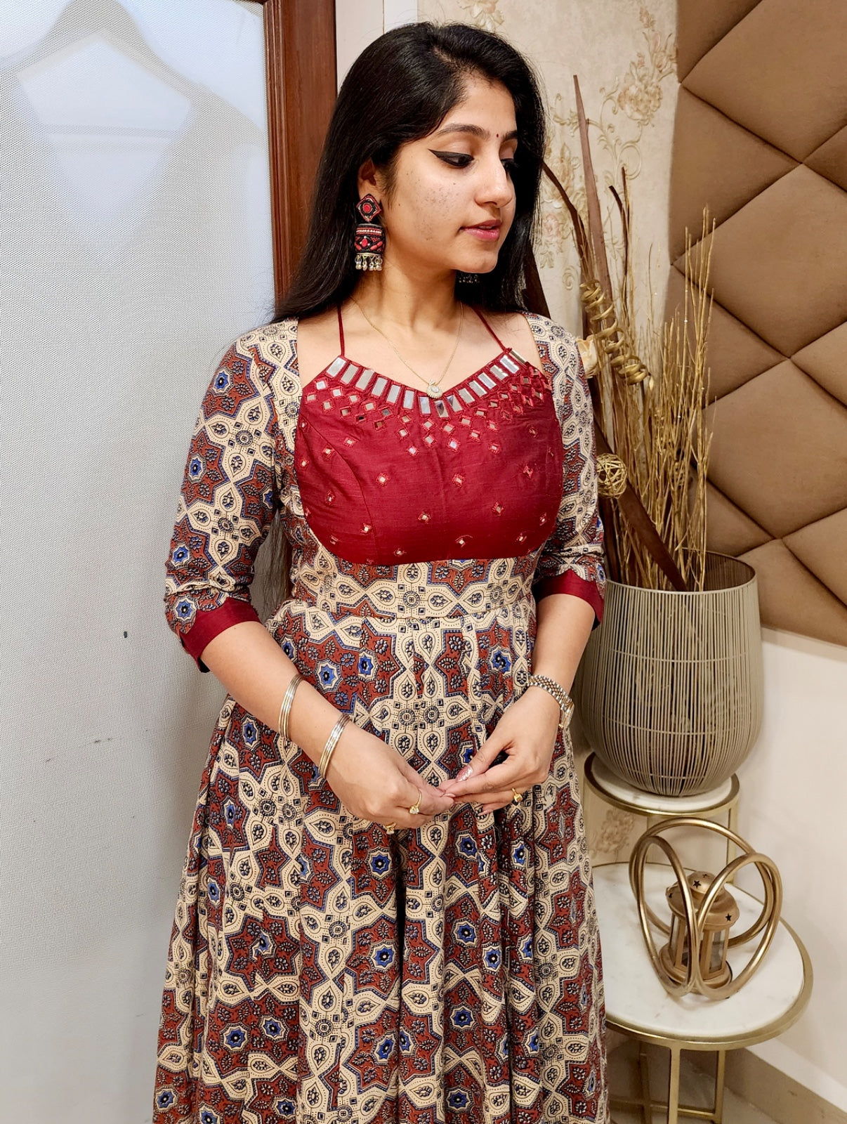 Half white dark red ajrakh anarkali.