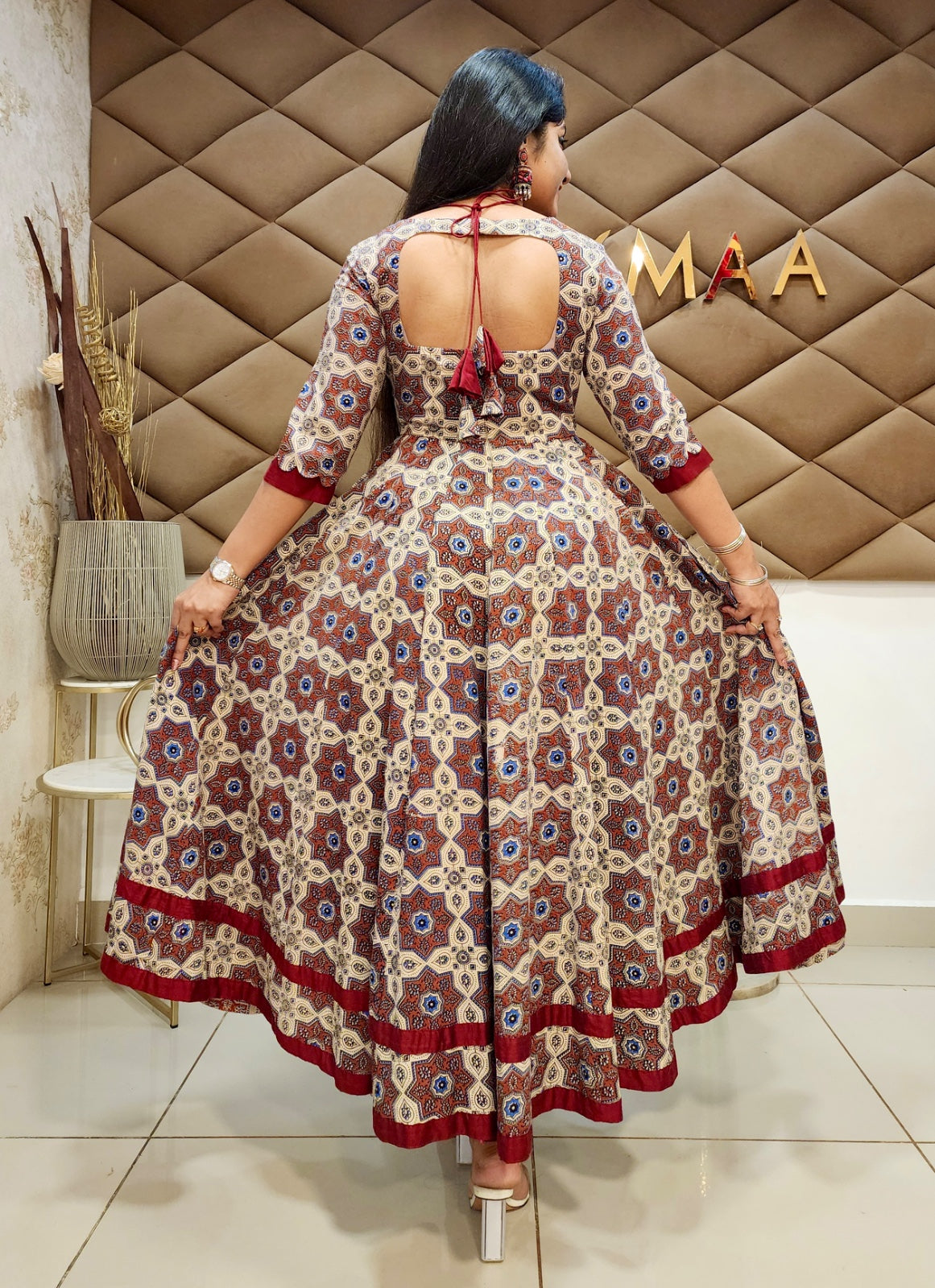 Half white dark red ajrakh anarkali.