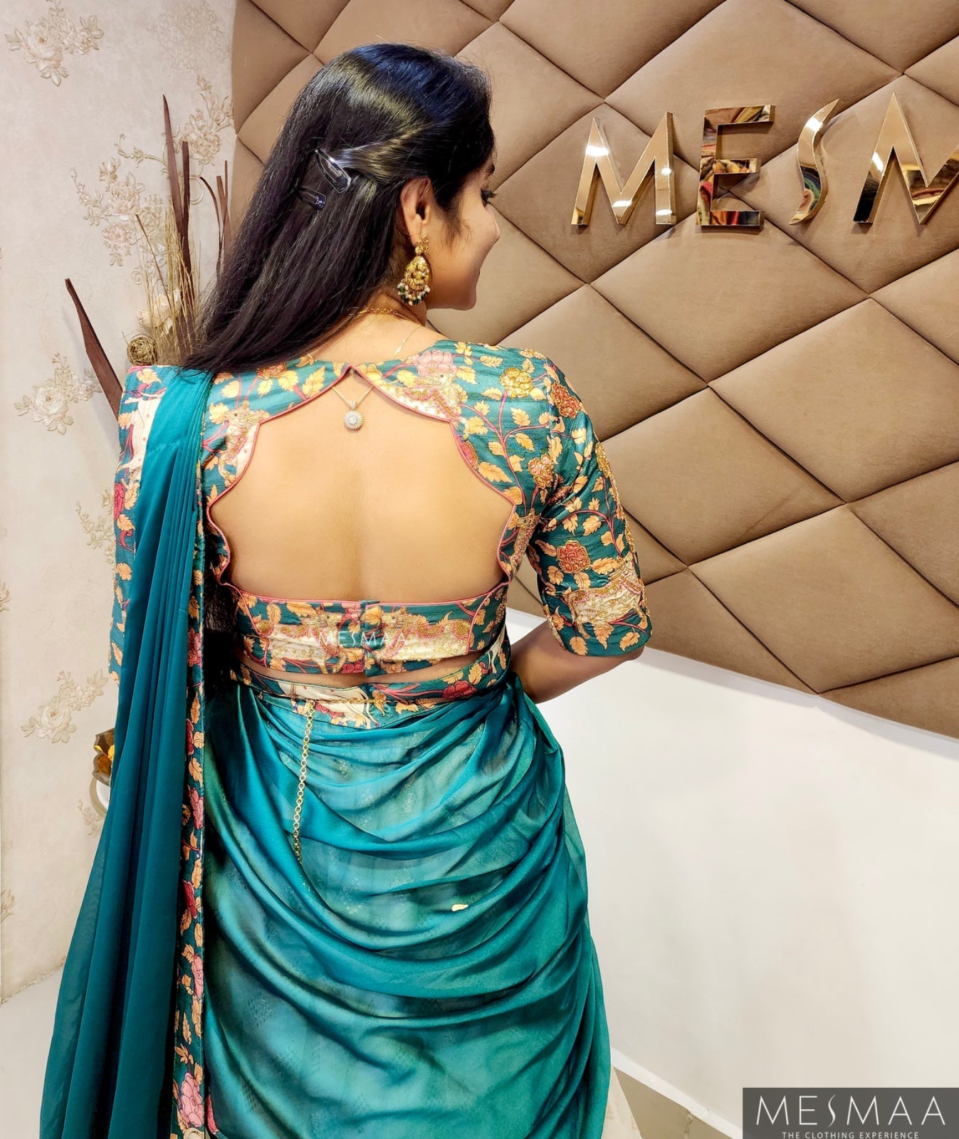White Teal Pichwai lehenga.