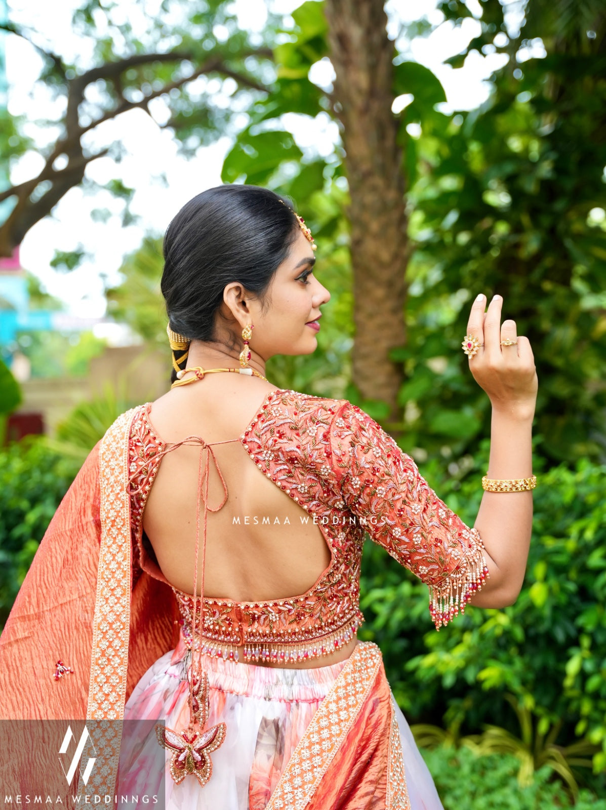 WHITE MATTALIC RUST FLORAL LEHENGA.