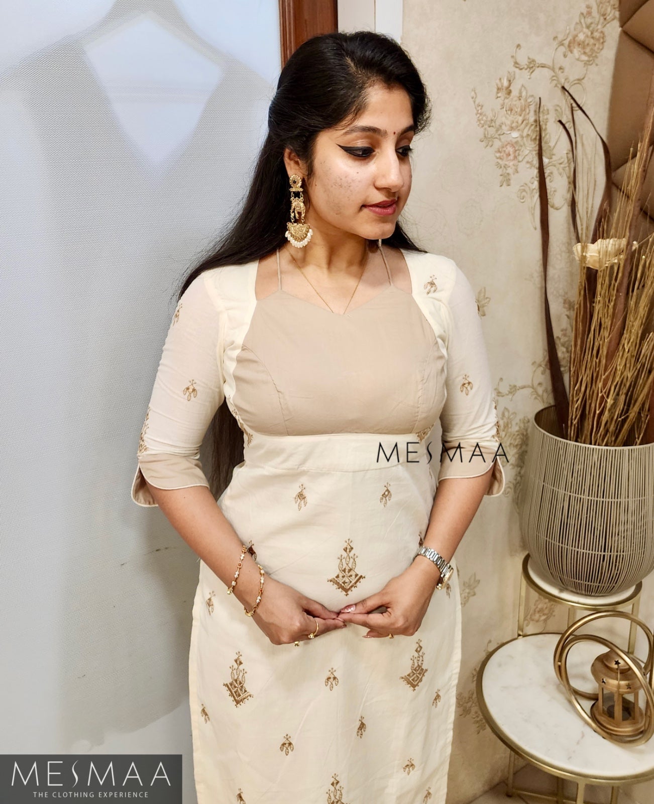 Half white beige kurti set.