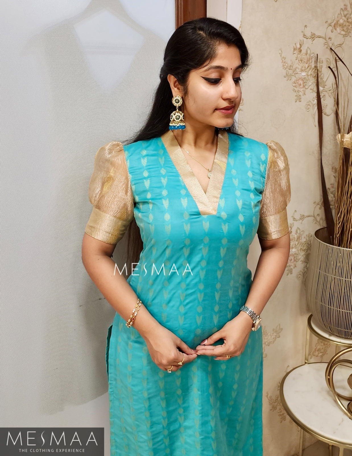 Sky blue gold kurti set.