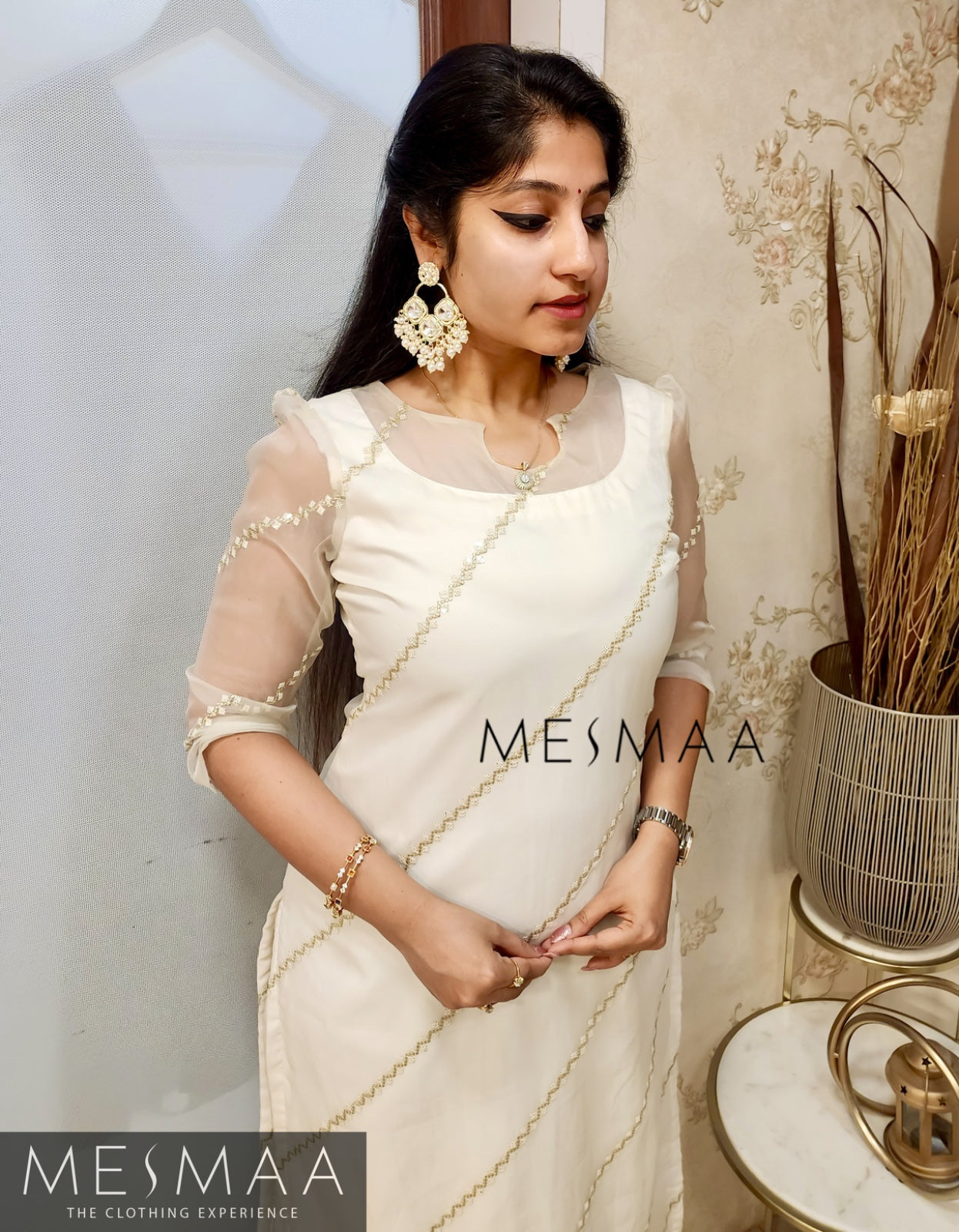 Half white kurti set.