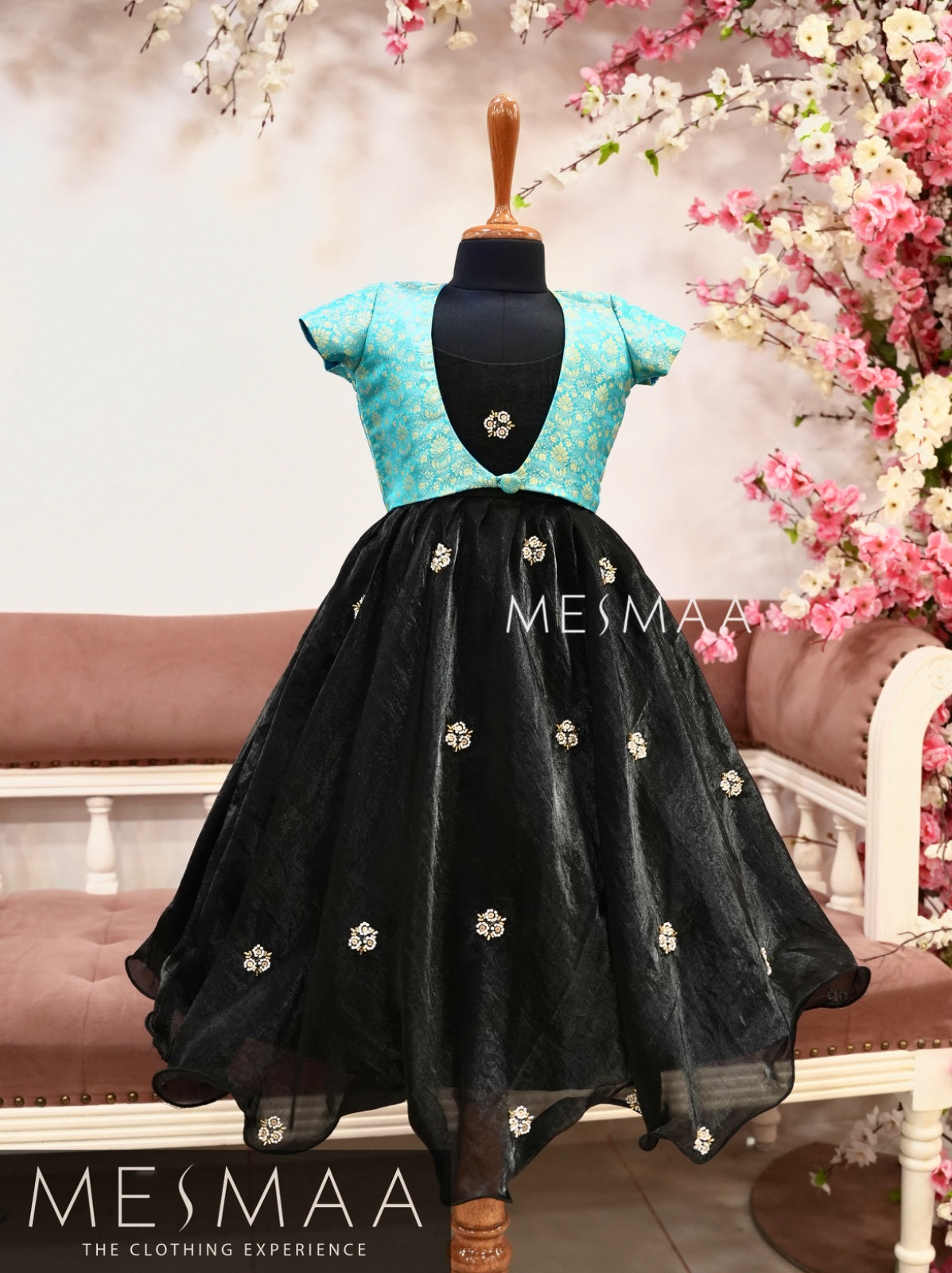 Sky blue black kids gown.