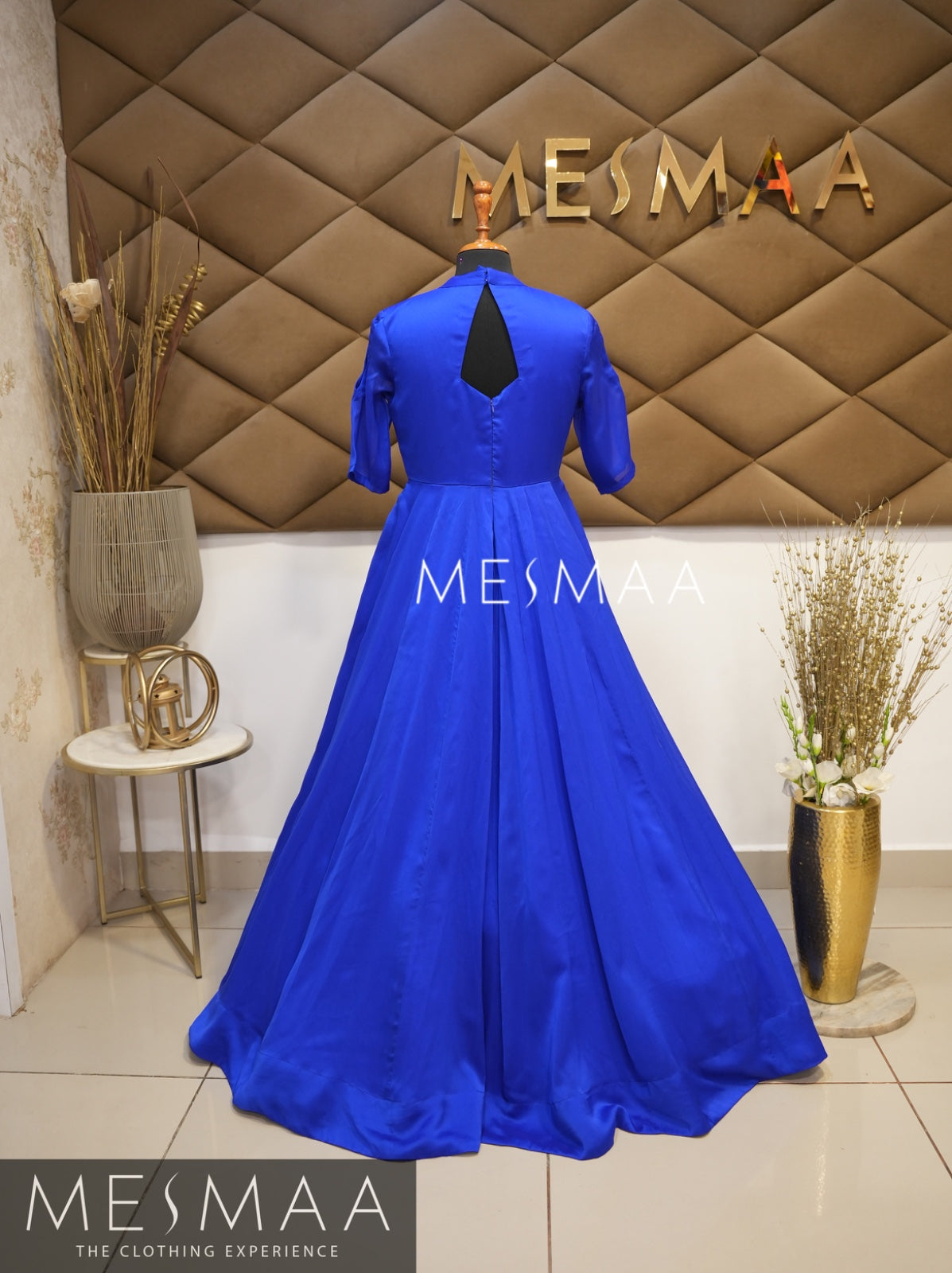 Electric blue bottle green Banarasi dupatta gown.