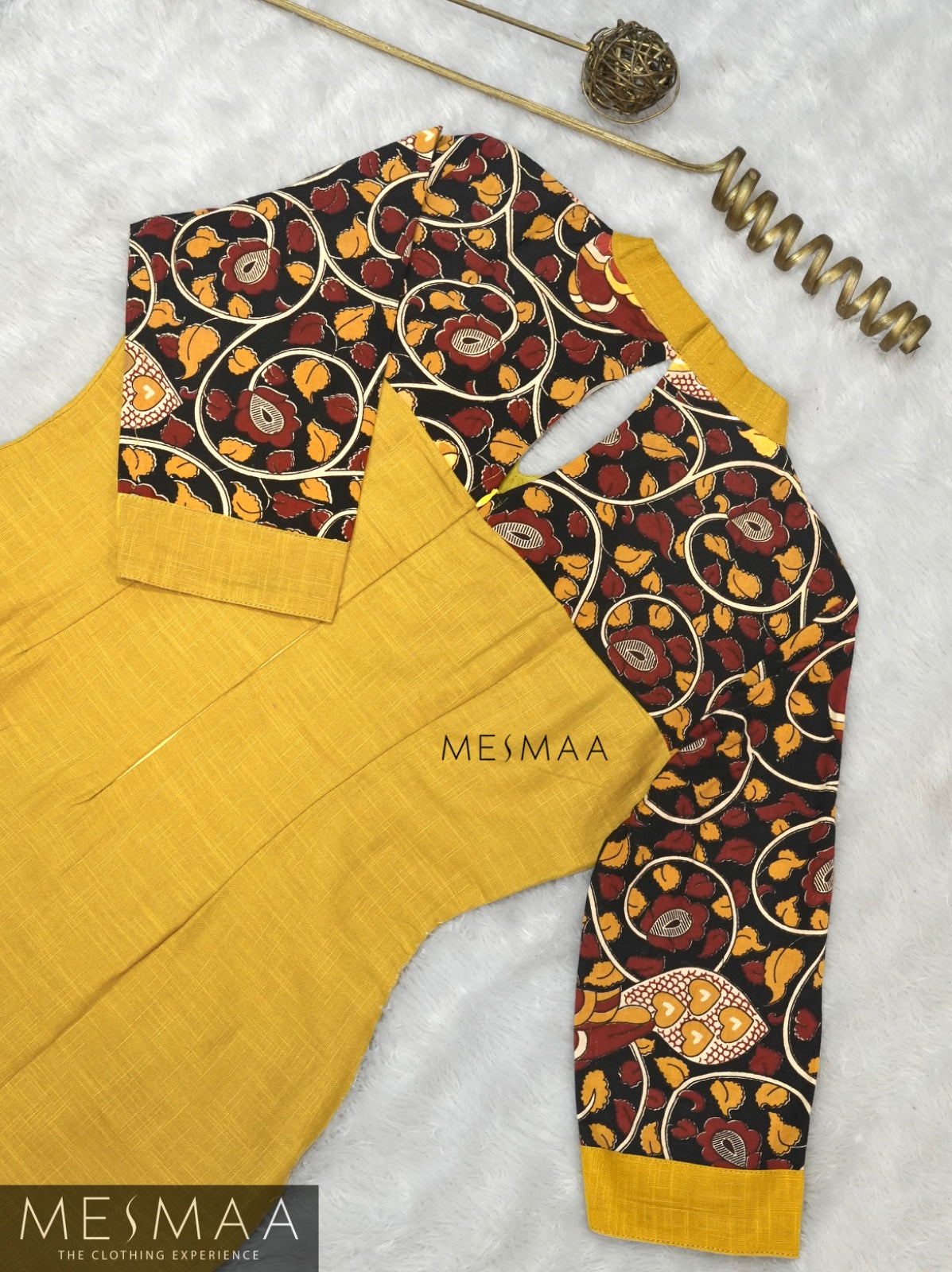 Mustard yellow black kalamkari kurthi.