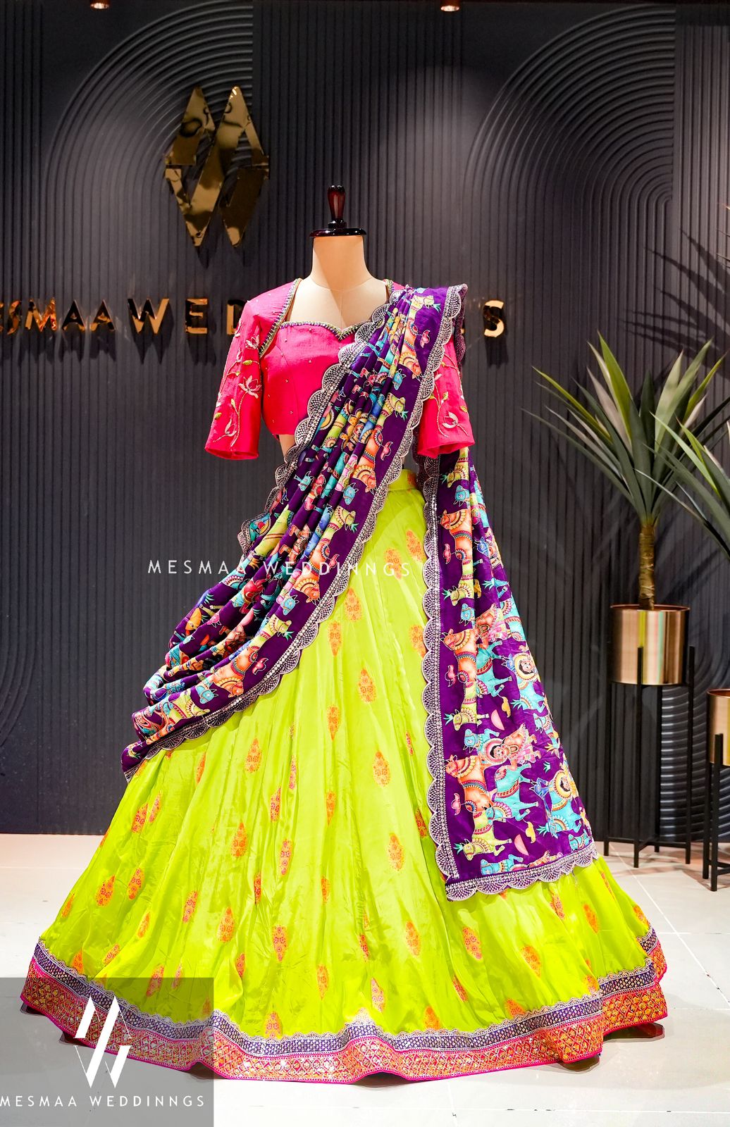 Green violet pink lehenga.